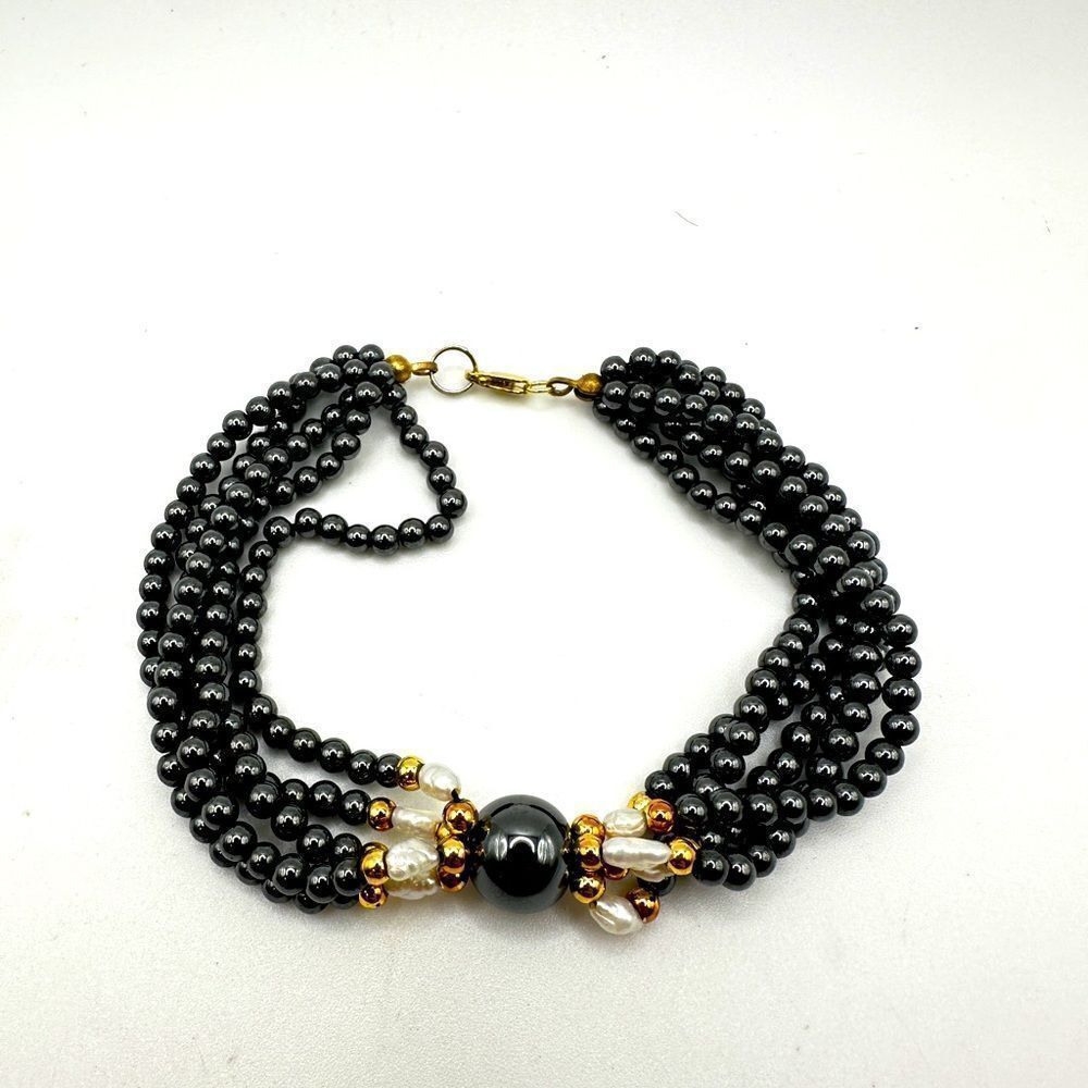 Revived Hematite and rice pearl with gold tone accent beads, 925 clasp bracelet!